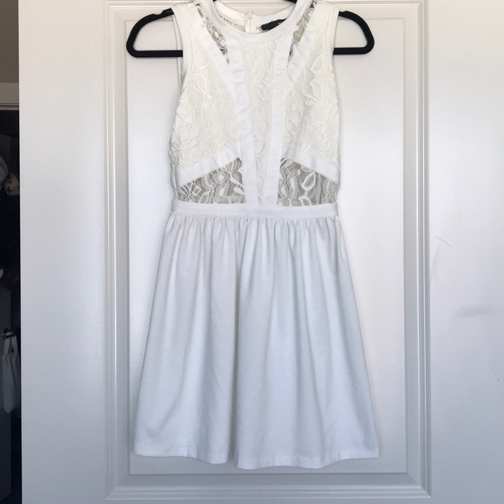 White mini dress with lace top. Perfect for spring